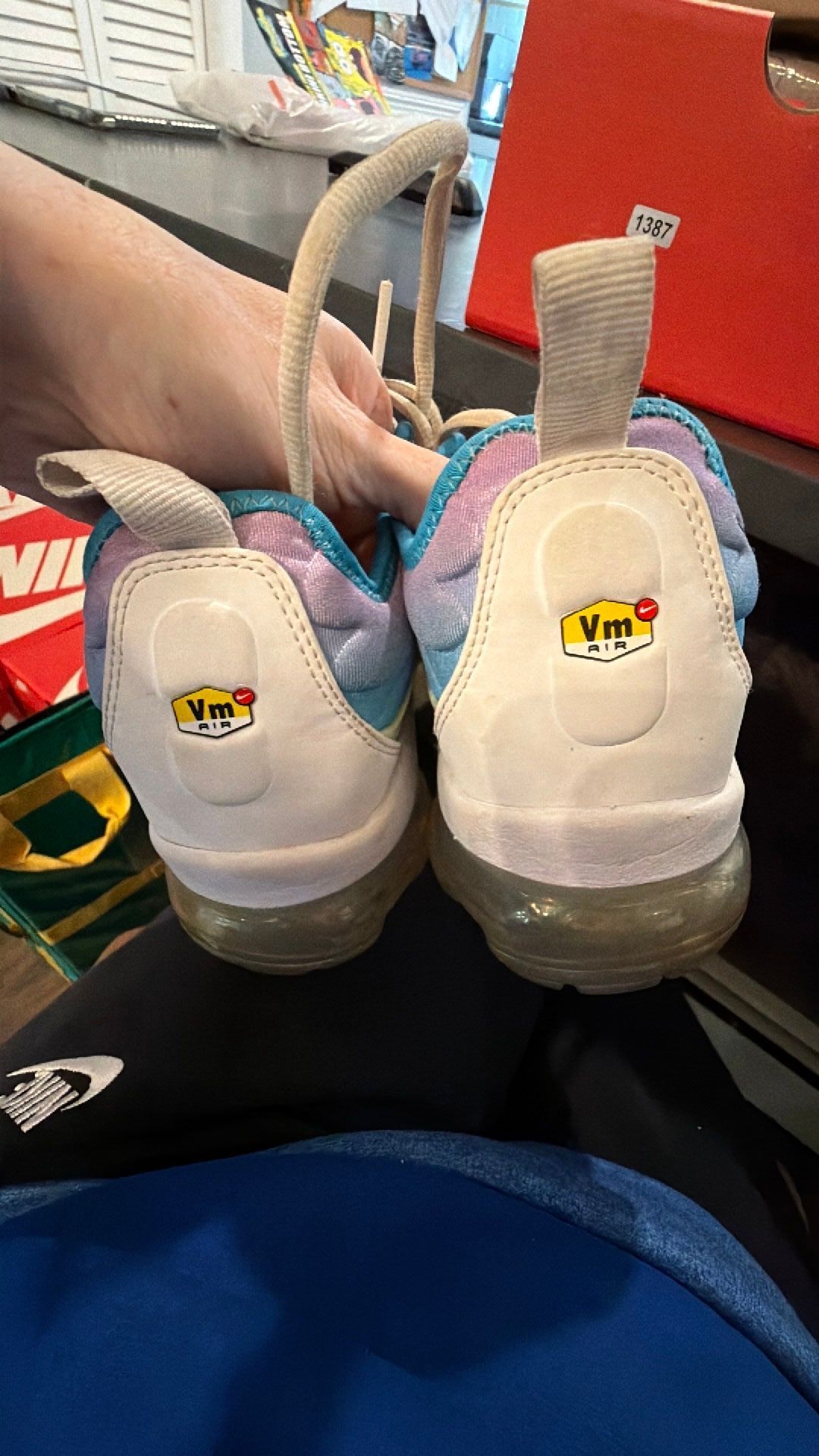 1387 Nike Air VaporMax Plus sneakers in a vibrant "Lava Glow" colorway