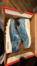 1882 Nike Air Max 90 sneakers featuring a plush, aqua blue velvet upper.
